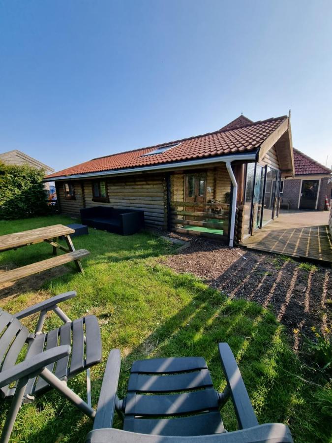 Finse Woning Op Camping De Tulpenweide Breezand Exterior photo